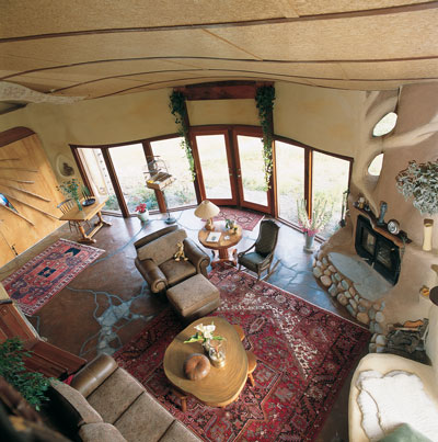Downstairs, the home’s curving, undulating space has lots of texture.